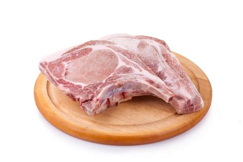 Chuleta De Cerdo Cruda Sobre Filete De Chuleta De Cerdo Ancho De Madera