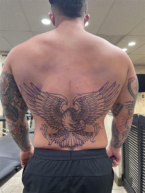 Men S Upper Back Tattoo Ideas Riccda