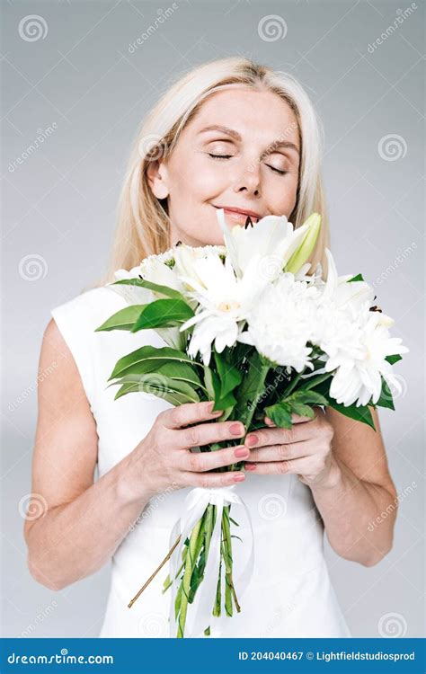 Pleased Blonde Mature Woman Stock Image Image Of Plants Caucasian