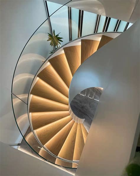 Penthouse Helical Staircase With Frameless Glass Railing