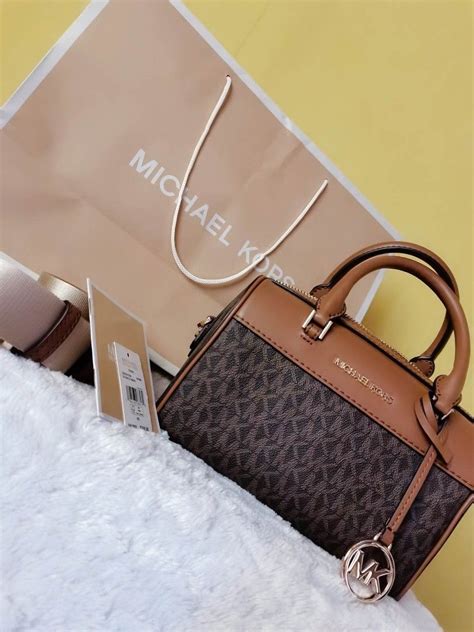 Michael Kors Mini Duffle On Carousell