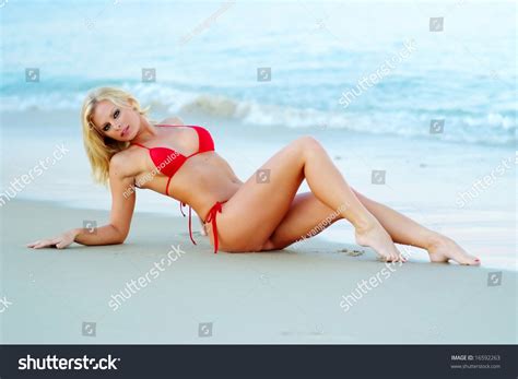 Sexy Blonde Woman Posing On Beach Stock Photo 16592263 Shutterstock