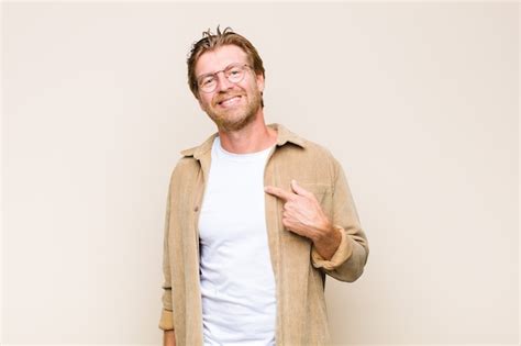 Premium Photo Blonde Adult Blonde Man Wearing Glasses Isolated