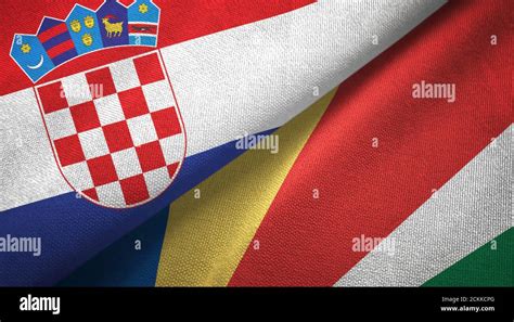 Croatia And Seychelles Two Flags Textile Cloth Fabric Texture Stock