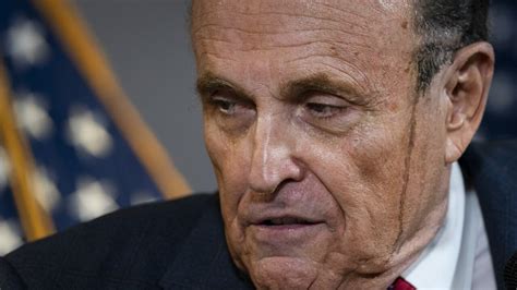 Hair dye sweat drips from Rudy Giuliani’s face in press conference ...