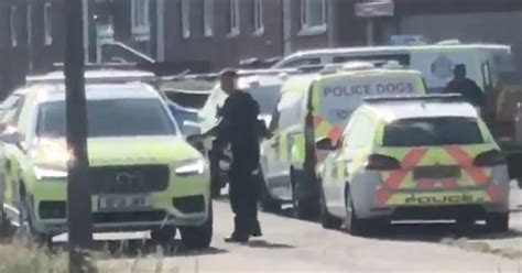 Scots Street Locked Down By Armed Cops After Two Men Injured During