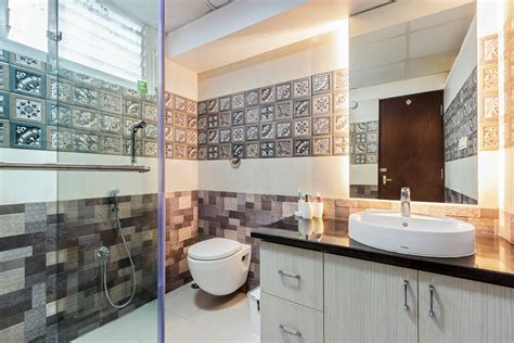 Spacious Bathroom Design With Brown And White Tiles Livspace