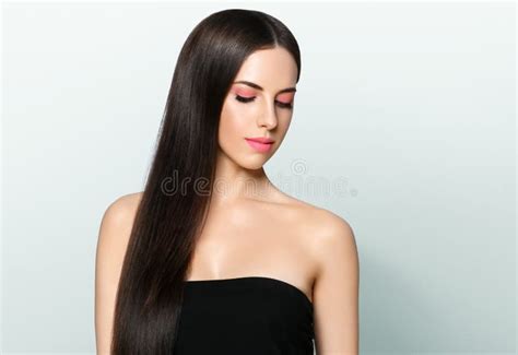 Beautiful Brunette With Long Hair And Pink Lipstick And Manicure Stock Photo Image Of Nails