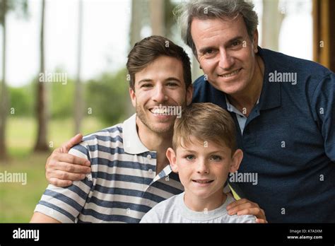 Mature Man With Son And Grandson Portrait Stock Photo Alamy