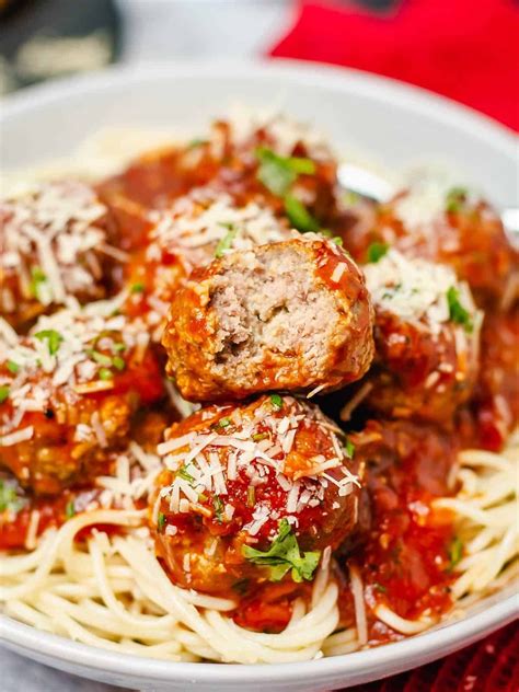 Easy oven baked meatballs made with both ground pork and beef and then left to simmer in ...