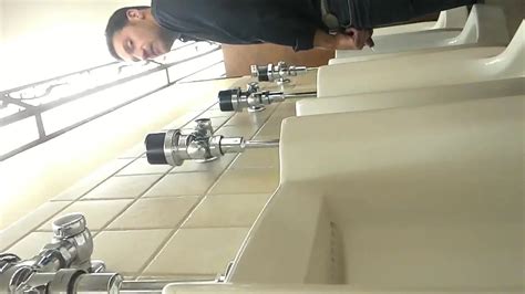 SPYING HOT GUYS AT THE URINAL Video ThisVid