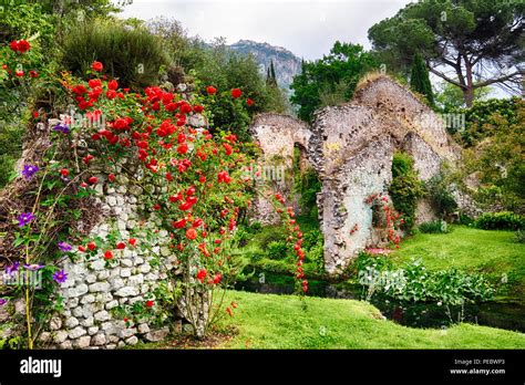 The Ninfa Garden With Historic Ruins And Blooming Flowers Cisterna Di Latina Lazio Italy
