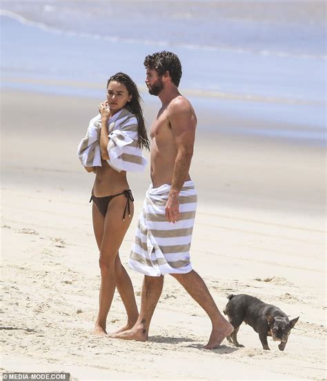 Shirtless Liam Hemsworth Packs On PDA With Bikini Clad Girlfriend Gabriella Brooks On Byron