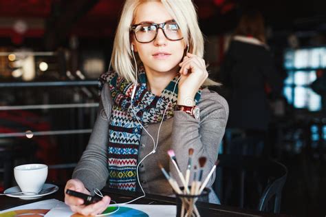 Blonde Girl With Mobile Phone And Headphones Stock Photo Image Of Clothing Eyes