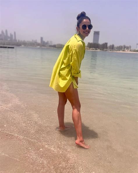 Rakul Preet Singh Stuns In Hot Neon Green Bikini While Sunbathing At