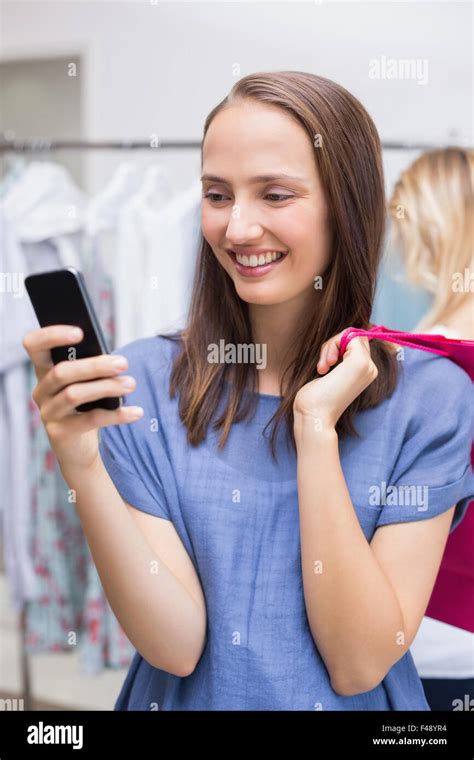 Pretty Brunette Sending A Text Message Stock Photo Alamy