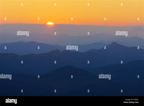 Mountain Silhouettes At The Sunset Stock Photo Alamy