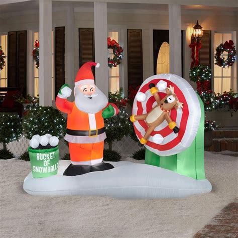 Animated Santa Throwing Snowball At Reindeer Christmas Inflatable