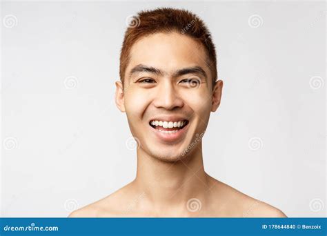 Beauty Skincare And Men Health Concept Headshot Of Enthusiastic Handsome Asian Man With Naked