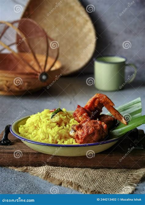 Fried Chicken And Yellow Flavored Rice In Close Up View Stock Photo