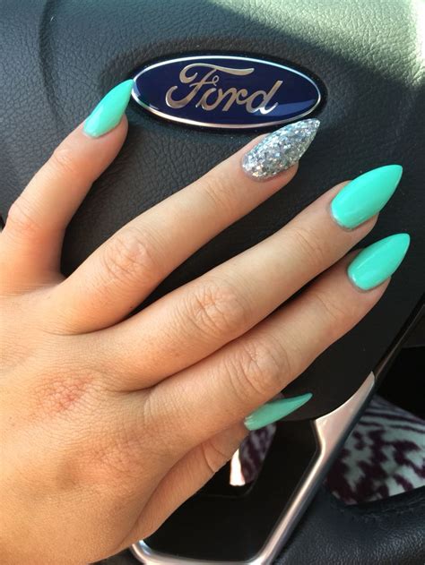 Combination Of Stiletto And Almond Nails Turquoise Blue With Chunky