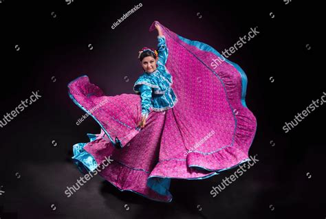 Mexican folk dancer woman from the state of nayarit, Mexican pink nayarrita folk costume with ...