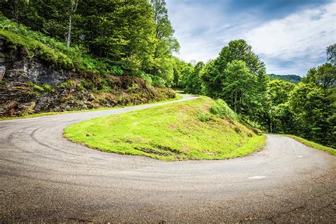 Winding Road With Sharp Curve Going Up The Mountain Photograph By