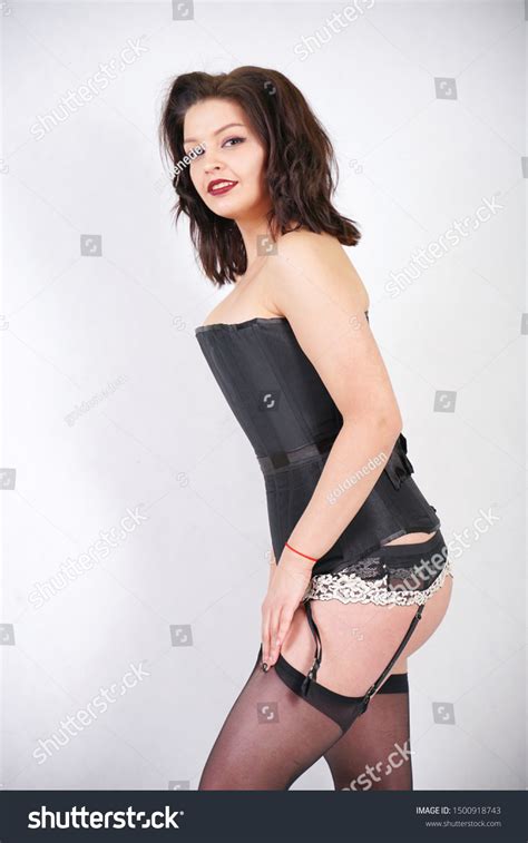 Sexy Brunette Garter Belt Stockings Corset Stock Photo