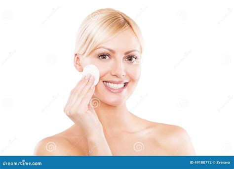 Picture Of A Happy Blonde Woman Cleaning Her Face Stock Photo Image Of Cleansing Treatment