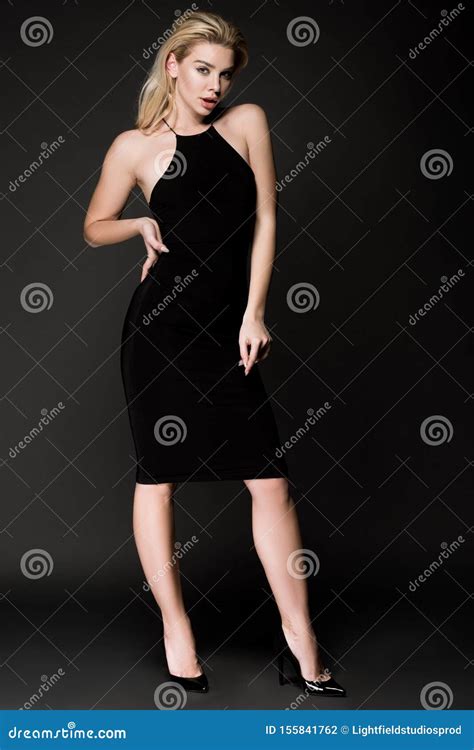 Attractive Blonde Girl In Black Dress Posing Isolated Stock Photo Image Of Style Beauty