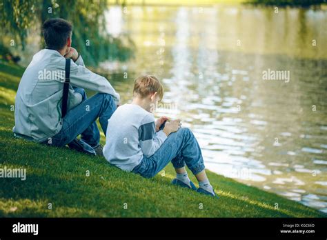 Father Son Tree Candid High Resolution Stock Photography And Images Alamy