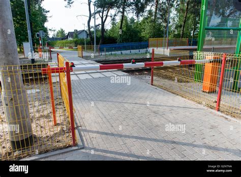 Barrier At The Railway Crossing Railway Station Stock Photo Alamy