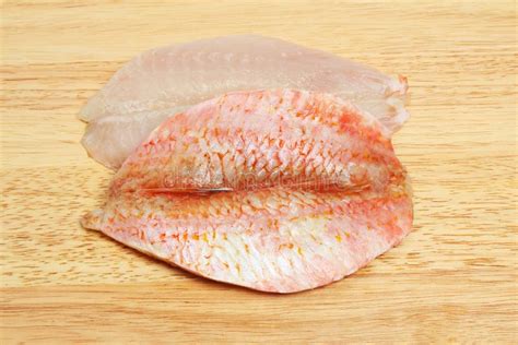 Red mullet fillets stock photo. Image of wood, skin - 276942136