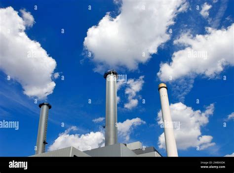 Heizkraftwerk S D In Munich A Power Plant With Three Chimneys White