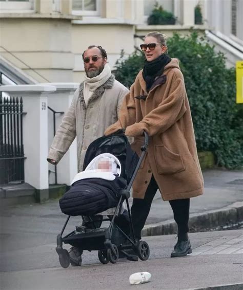 Jude Law and wife Phillipa Coan wrap up warm as they step out with new