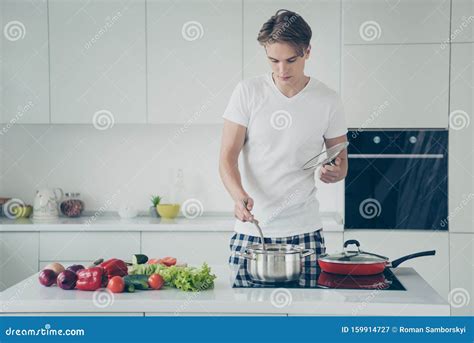 Portrait Of His He Nice Attractive Cute Serious Focused Guy Making Hot Delicious Soup Dinner