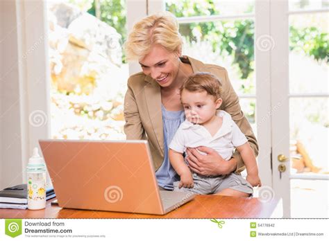 Smiling Pretty Blonde Woman Using Laptop With His Son Stock Photo Image Of Adult Smiling