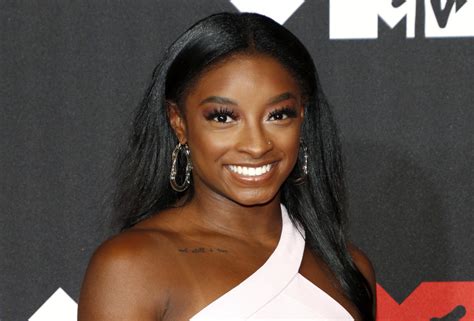 Simone Biles Strikes a Pose in Colorful Bikini During Turks & Caicos