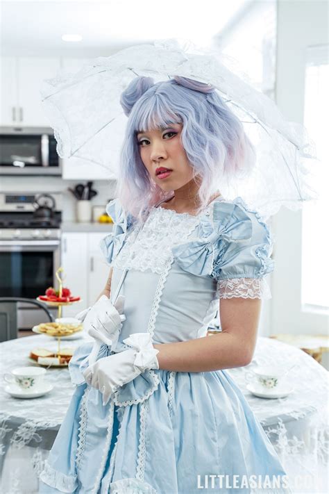 Playful Asian Chick Kimmy Kim Bends Over For Deep Pussy Penetraion Photos