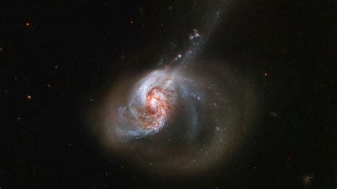 Two galaxies collide in NASA's majestic Hubble image | Mashable