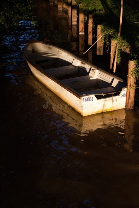 Boat On The Dock Of A River Editorial Photo Image Of Wood Painting