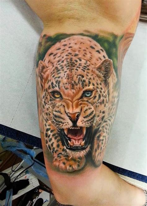 Cool colorful running cheetah tattoo for men on upper arm ...