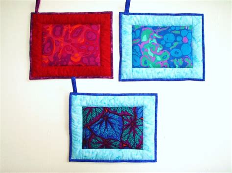 Oversized Quilted Pot Holder Hot Pad Red Pink And Orange Amoeba Fabric With Red Borders