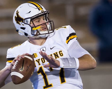 Wyoming QB Josh Allen goes through senior day festivities