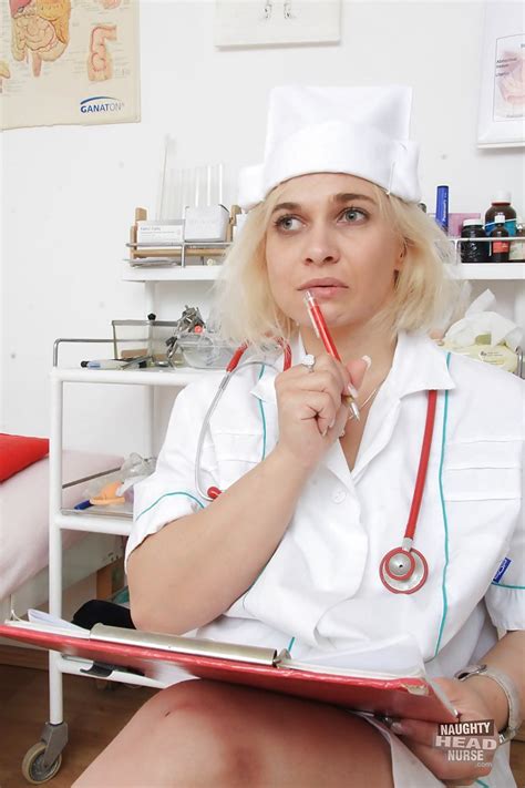 Older Blonde Nurse Sandy Masturbating And Toying Bald Cunt On Exam Table Porn Pictures XXX