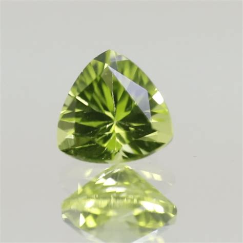 Chinese Peridot Lemon Green Trillion 038 Carat Pen00058