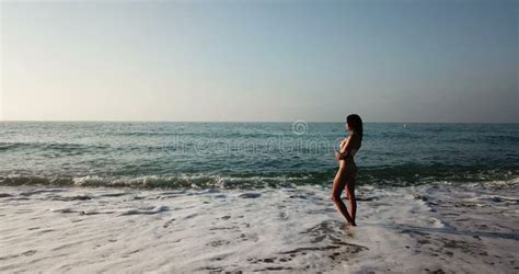 Naked Girl Standing Back To Viewer On Sand Beach Against Sea Stock Video Video Of Back