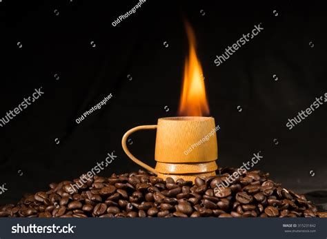 Hot Coffee Cup With Fire On Coffee Beans Stock Photo 315231842 : Shutterstock