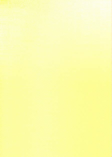 Premium Photo | Plain yellow textured vertical design background