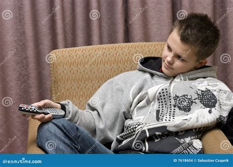 teenage boy  remote stock photo image  smiling